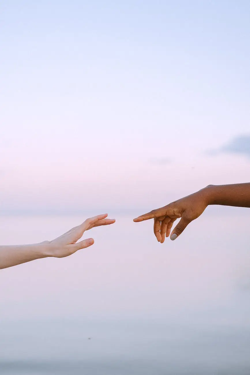 photo of people reaching each other s hands